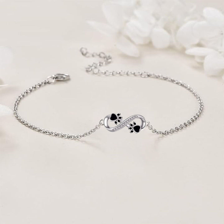 Bracciale con Simbolo dell'Infinito e Charm a Stampa di Zampa con Zirconia