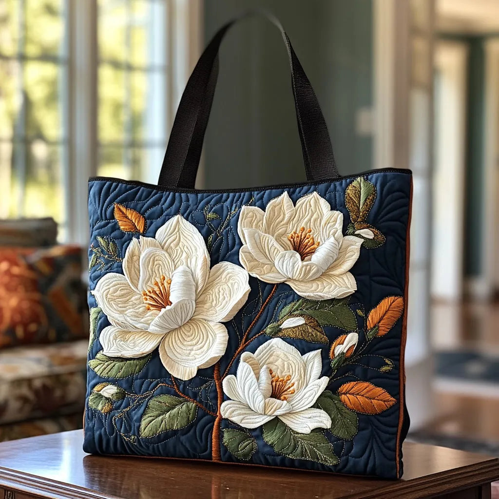 Frida – Borsa a tracolla imbottita con magnolie ricamate