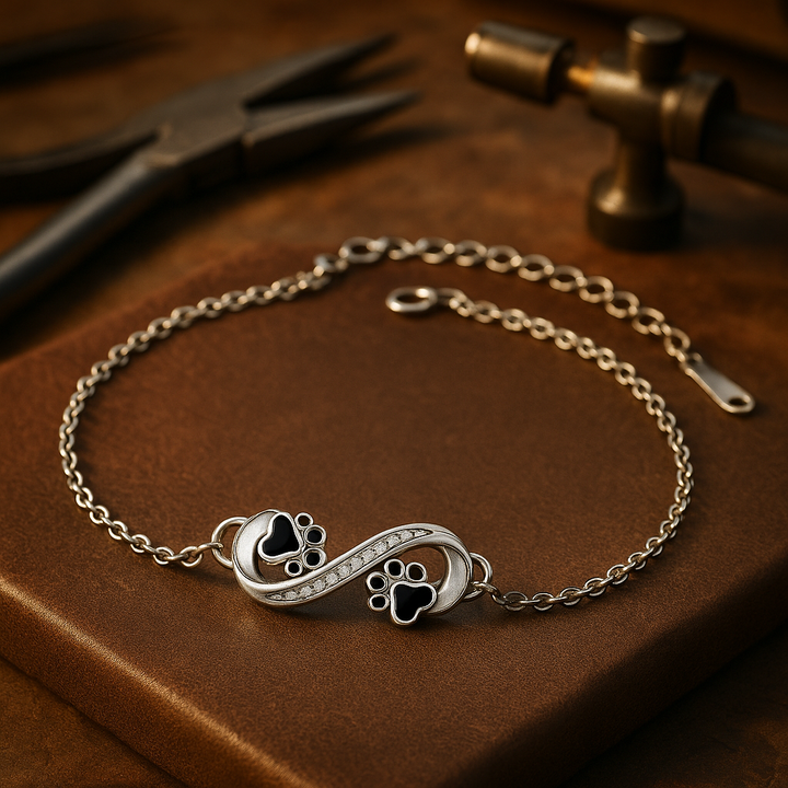 Bracciale con Simbolo dell'Infinito e Charm a Stampa di Zampa con Zirconia