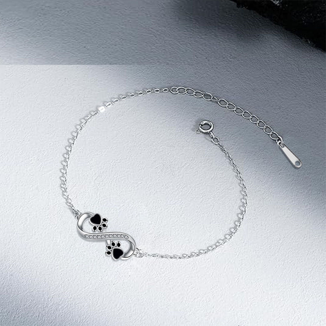 Bracciale con Simbolo dell'Infinito e Charm a Stampa di Zampa con Zirconia